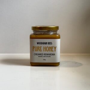 550g jar of Creamed Rewarewa honey by WoodGrain Bees