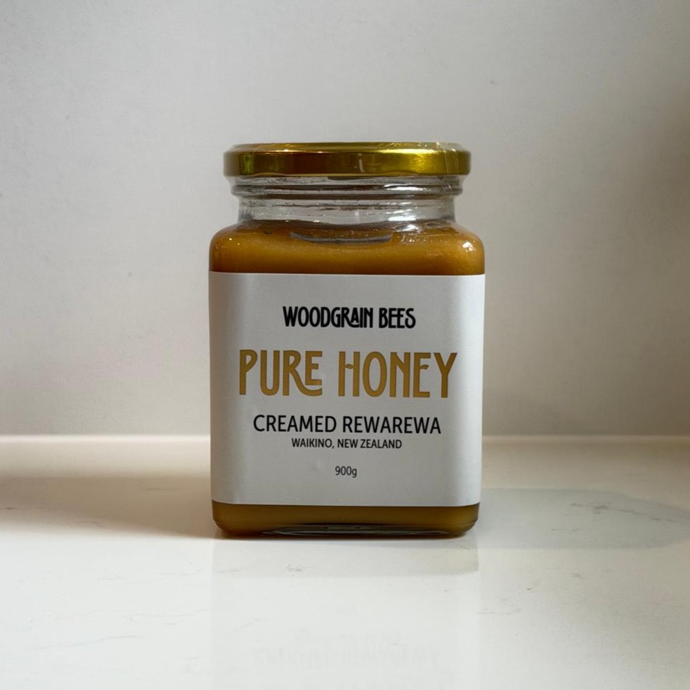 900g jar of Creamed Rewarewa honey by WoodGrain Bees